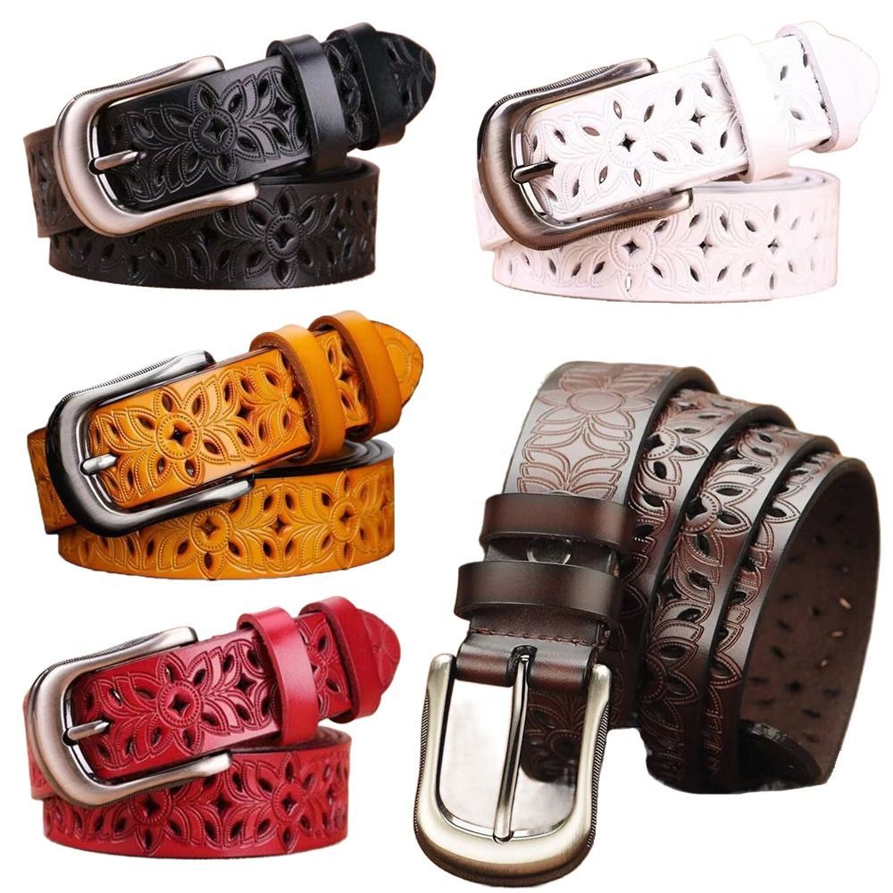 Collection of six leather belts in various colors with intricate designs and metal buckles on a white background.