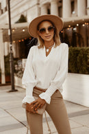 Wear a V-neck blouse for ladies