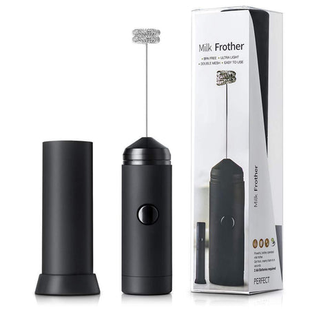 Black milk frother with packaging on a white background